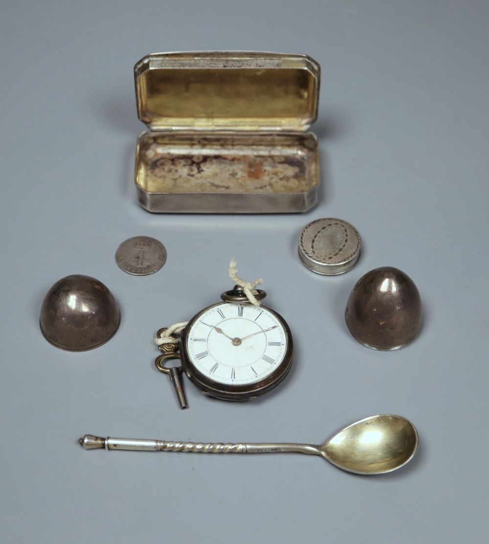 A French white metal snuff box, two other boxes including egg shaped, a Russian spoon, silver fob watch and a coin.